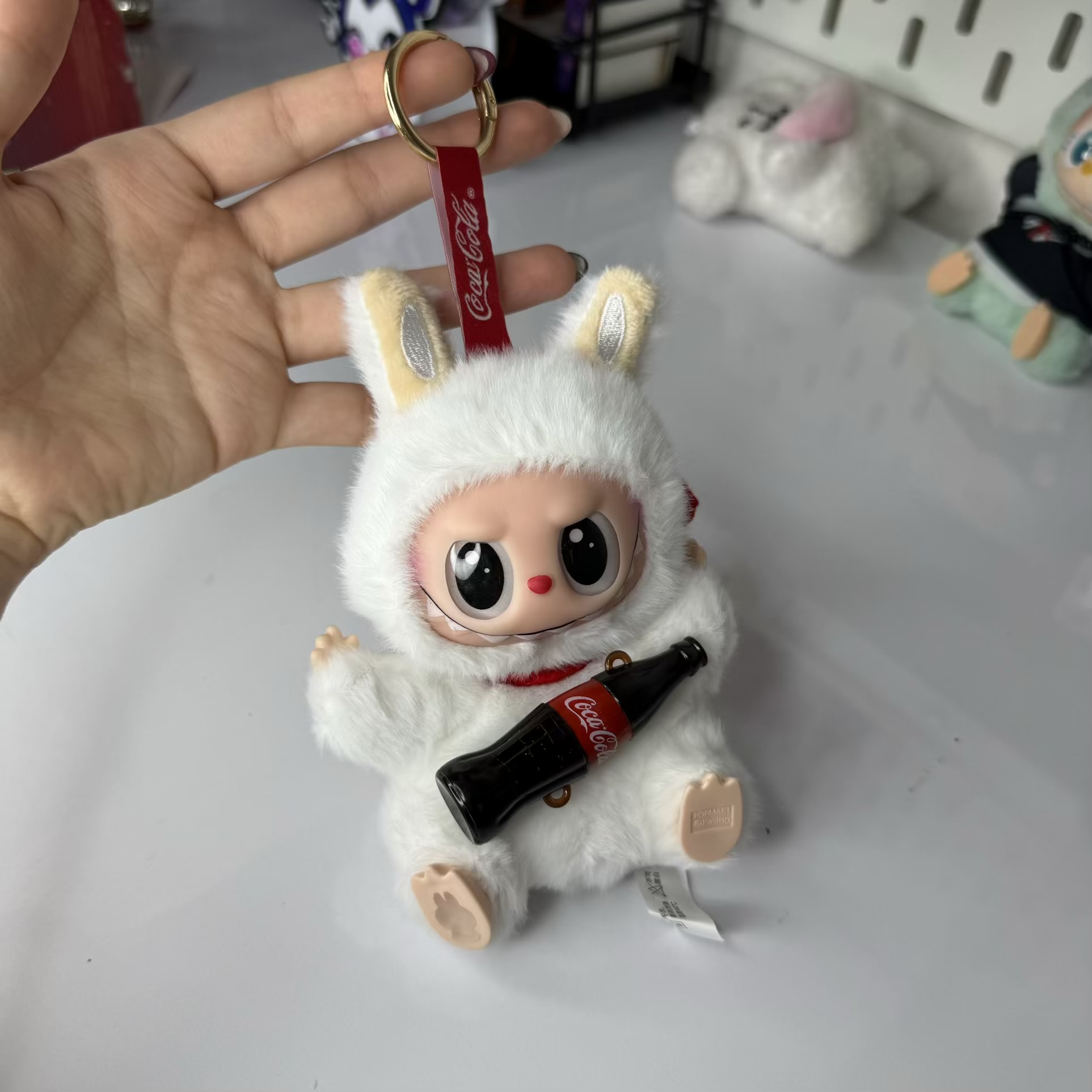 عروسک کوکاکولا لبوبو